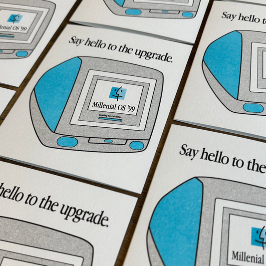 Cards with retro computer design and text 'Say hello to the upgrade' on a white background.